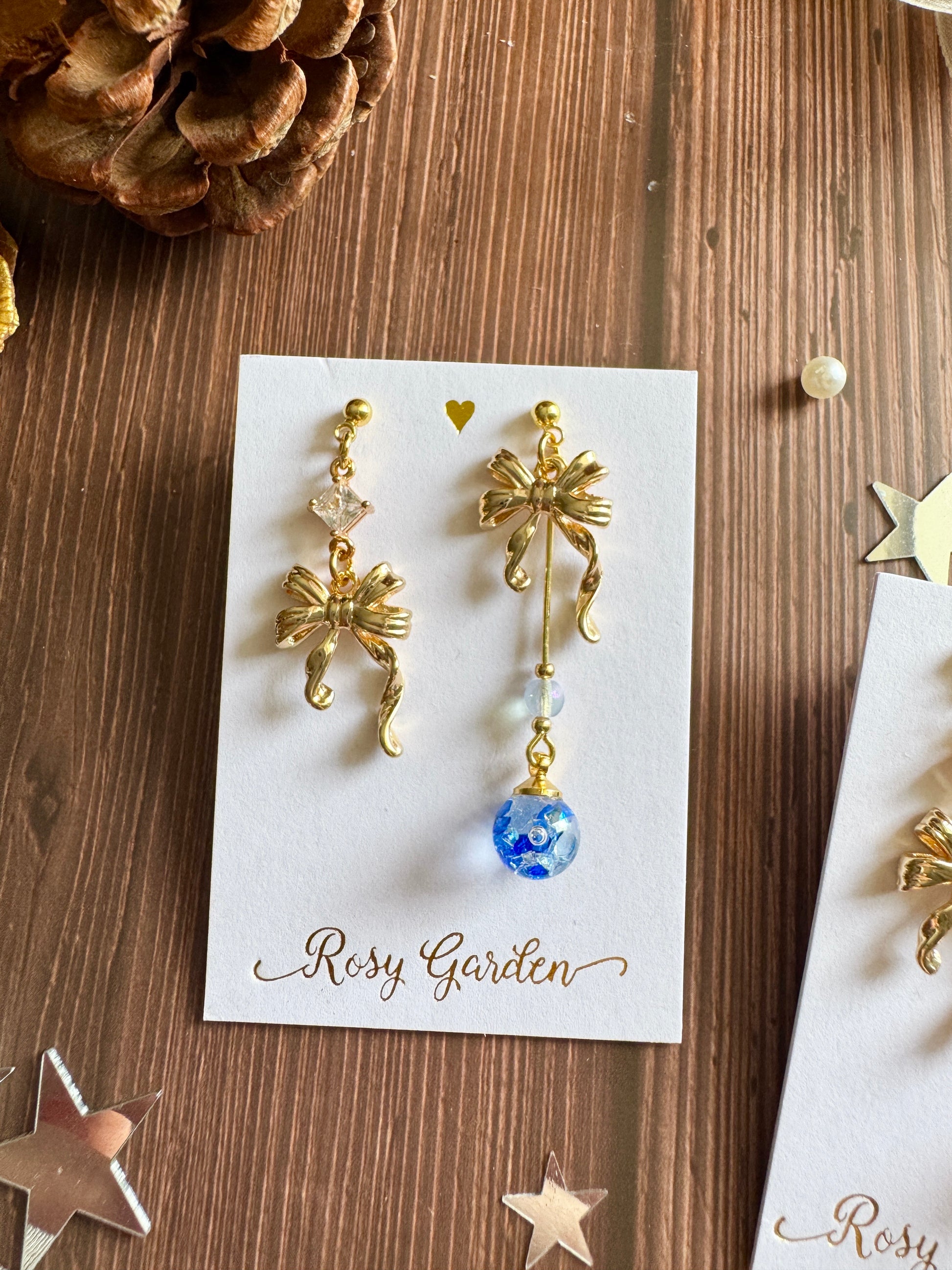 優雅節日水晶球耳環 蝴蝶結款 深藍色