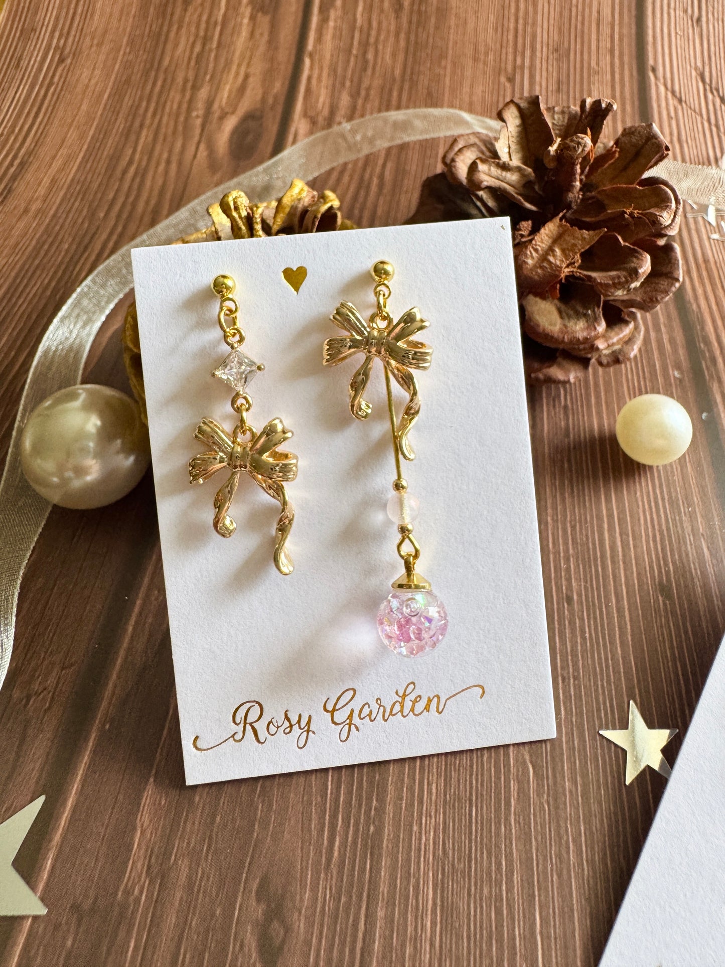 優雅節日水晶球耳環 蝴蝶結款 粉紅色